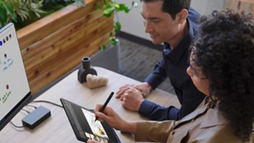 MSFT A person inks on Surface Go 3 while another observes RE3BvYe | Braintree