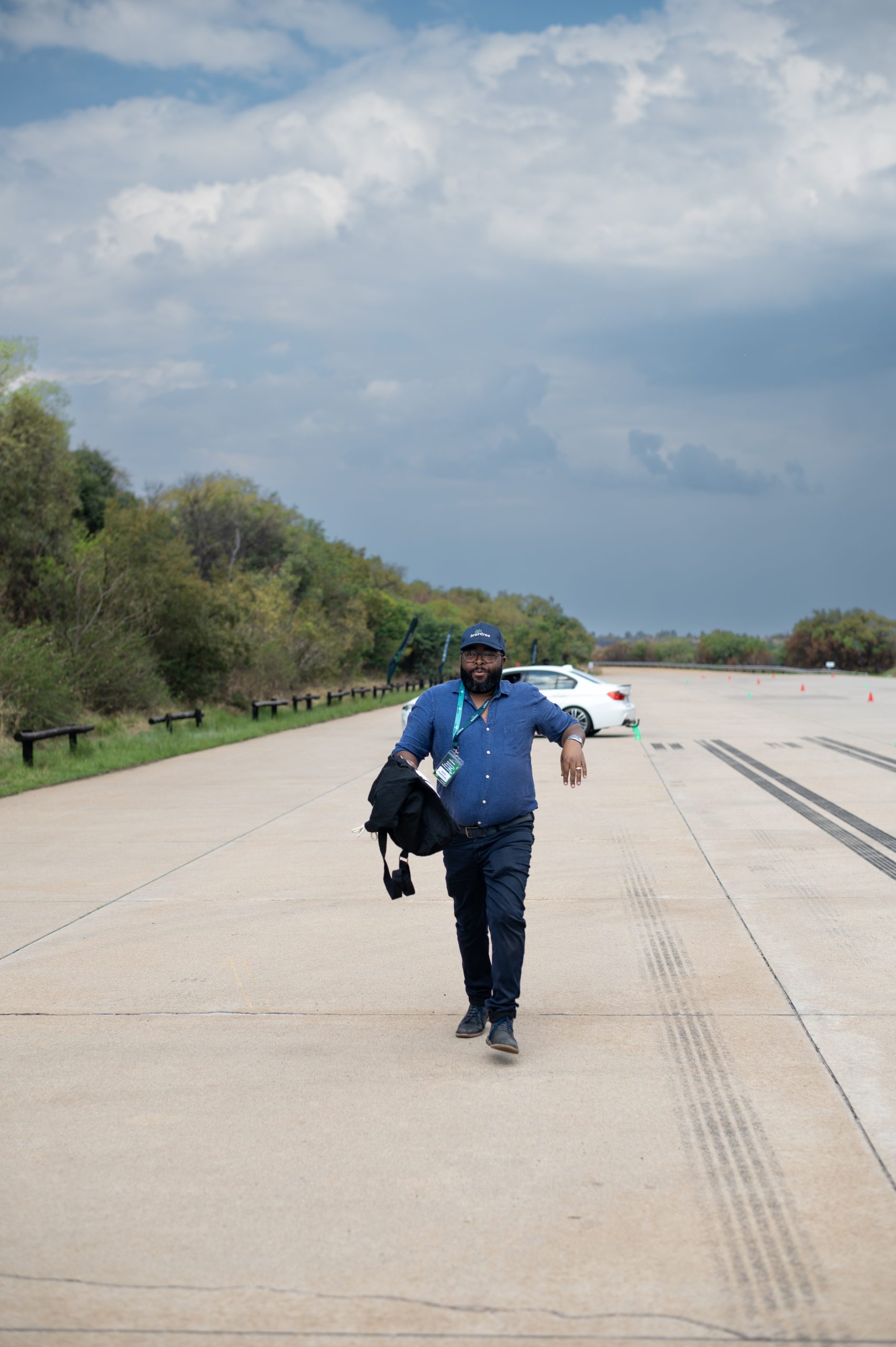 a Braintree employee running down a road - 8