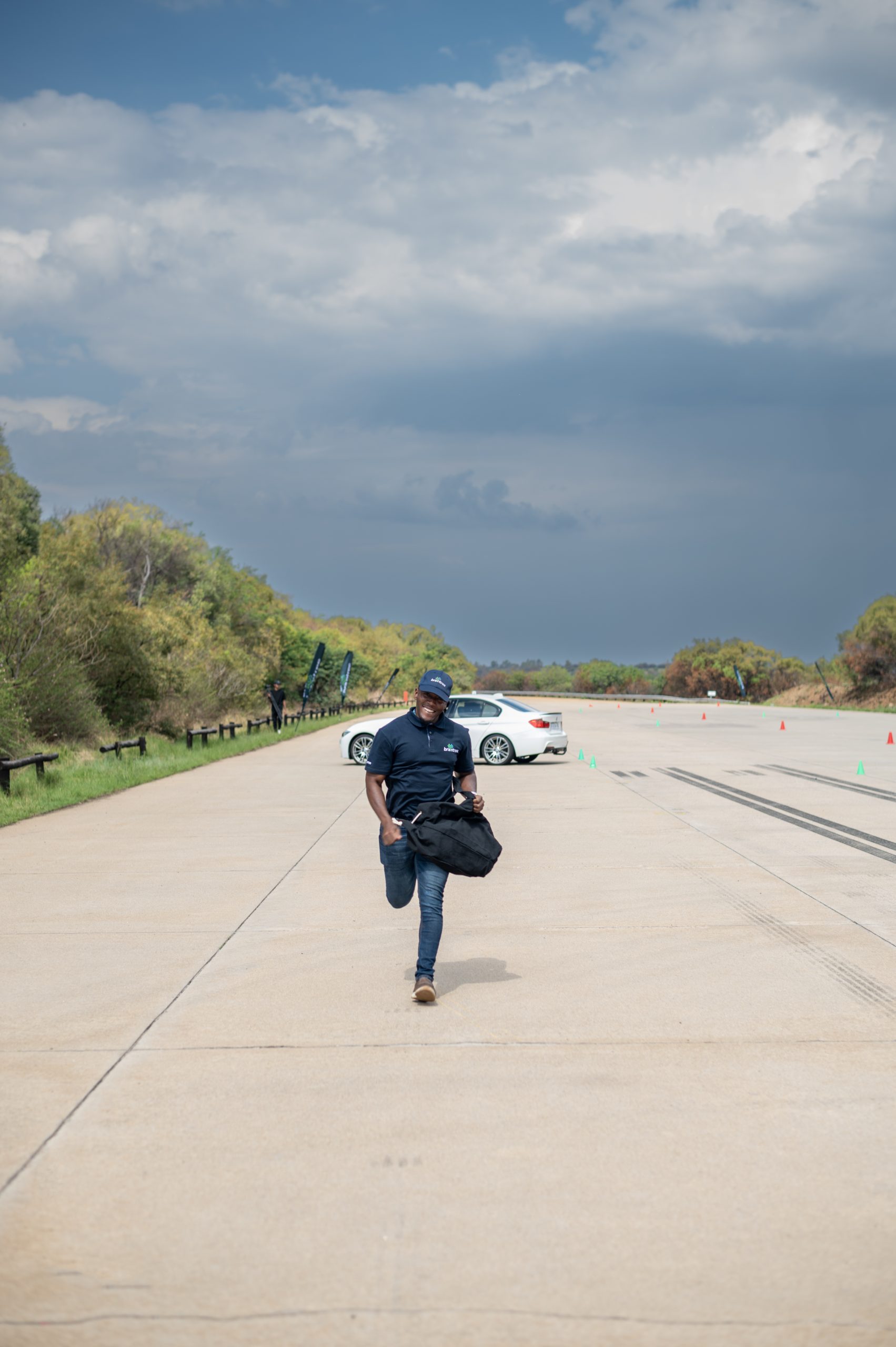 a Braintree employee running down a road - 6